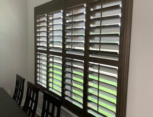 Wood stained plantation shutters 4 1/2” vanes with crown z frames.